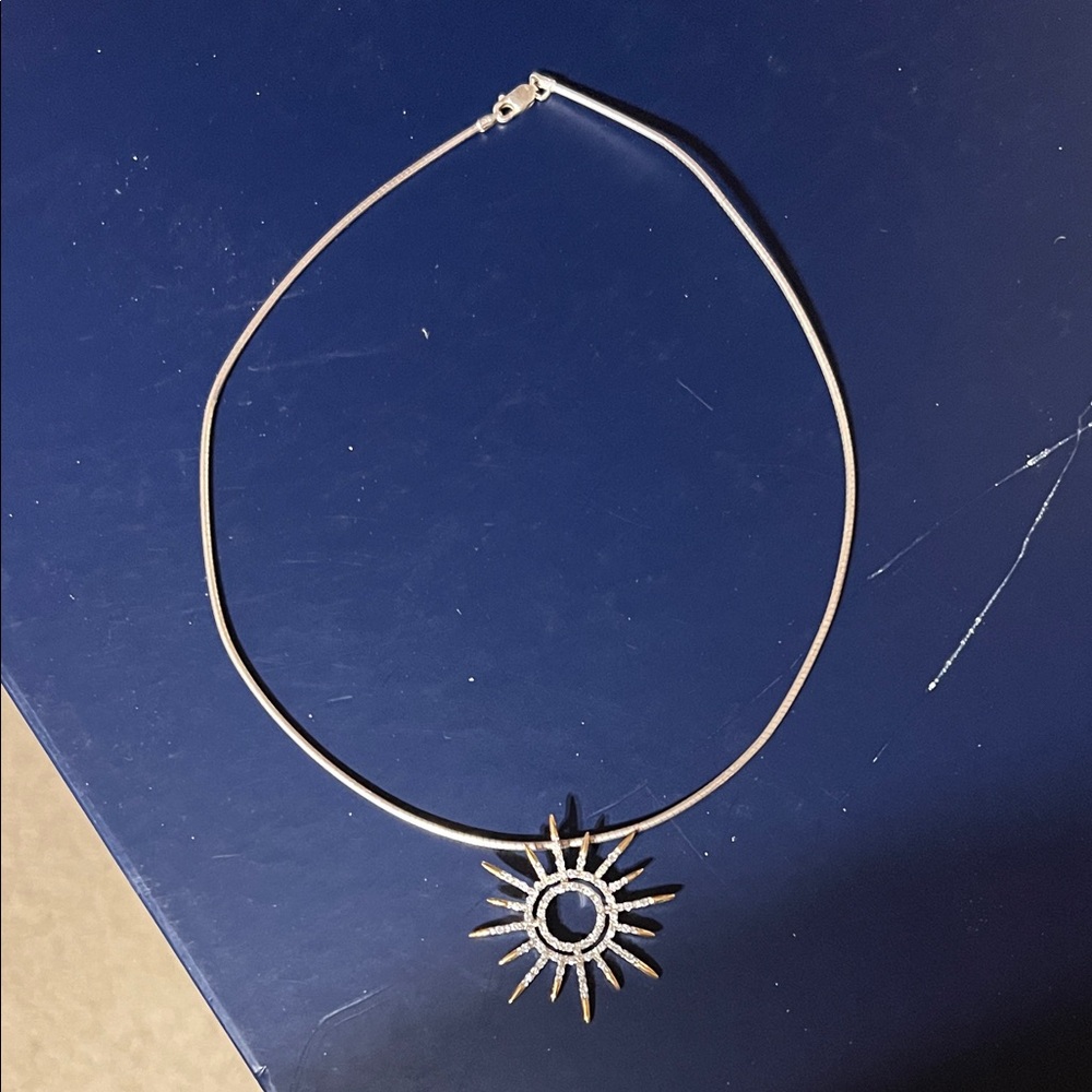 Elegant Silver Sunburst Pendant Necklace